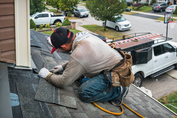 Professional Storm Damage Roof Repair technician working in Winnie, TX